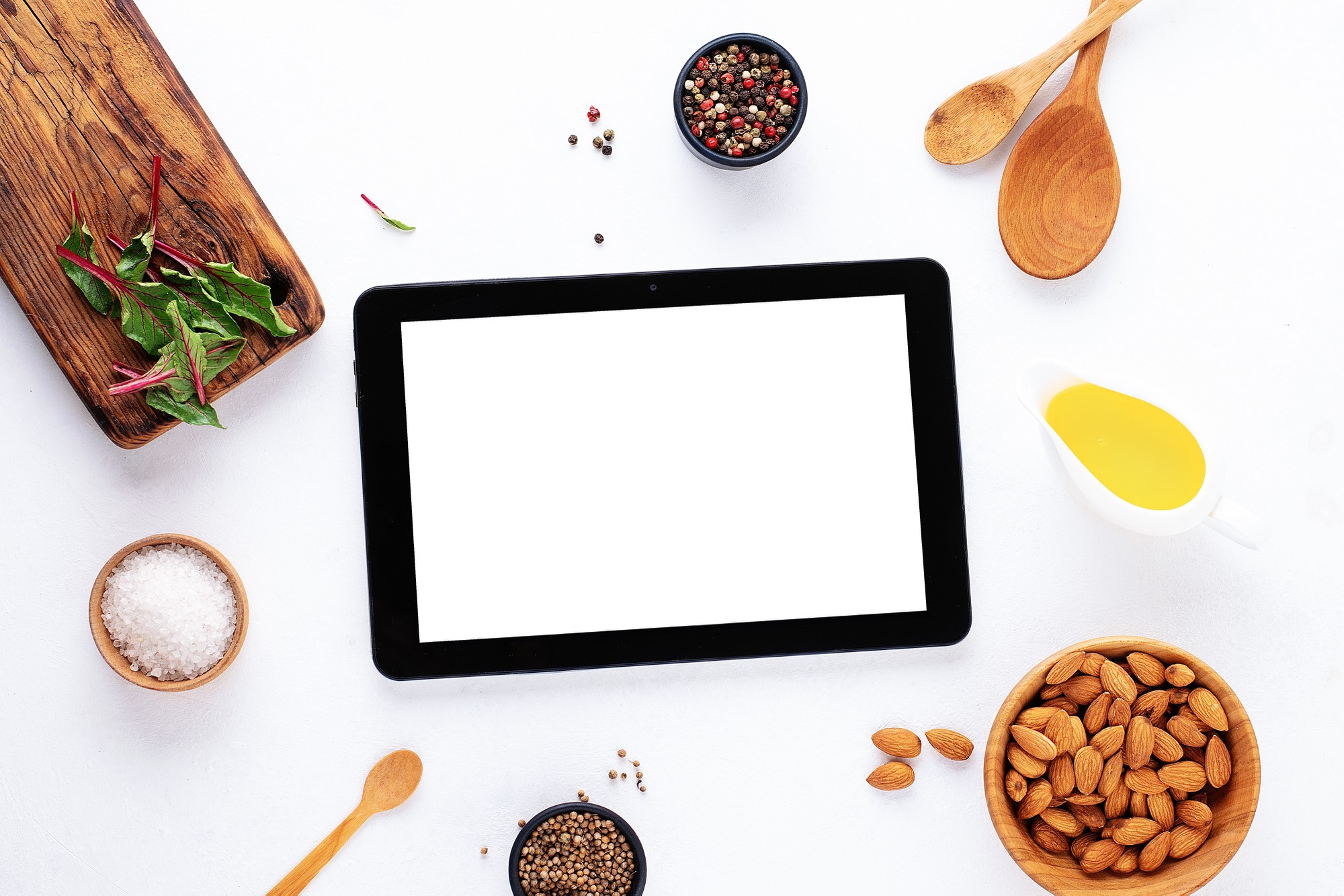 Desk con tablet che mostra un corso culinario